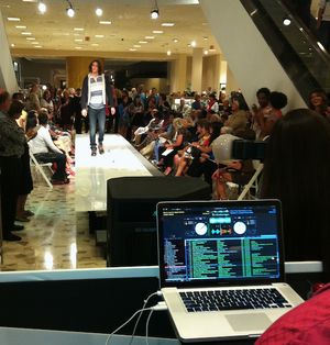 A model walking the runway at a fashion show