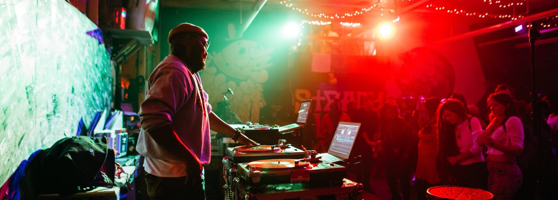 DJ spinning at a party