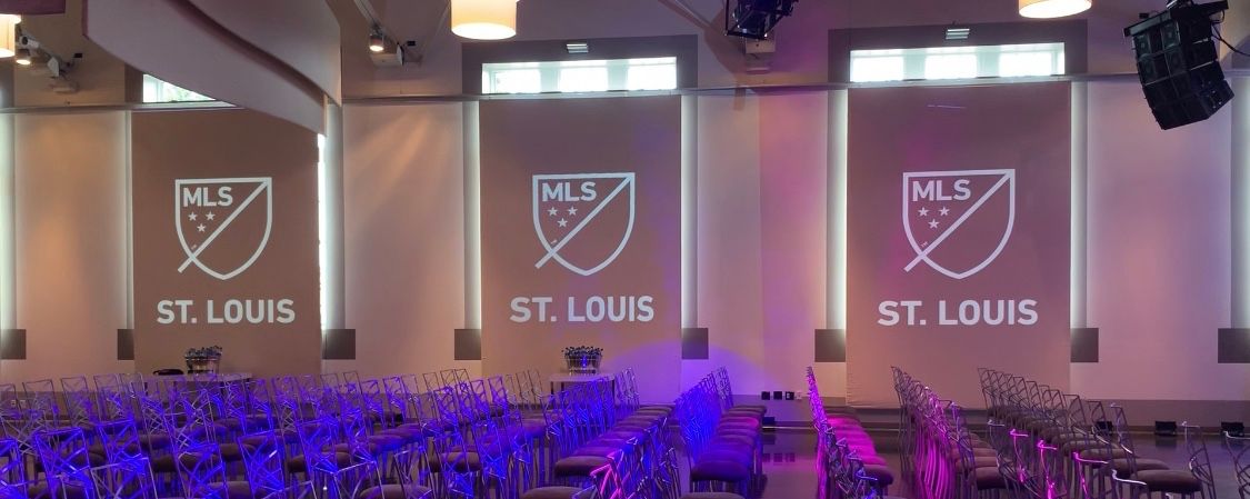 Major League Soccer St. Louis logo video mapped on the wall at a press conference