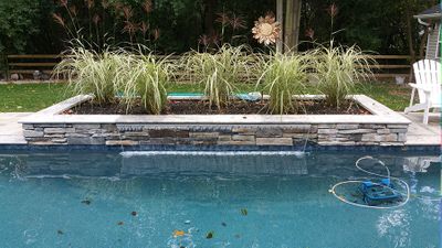 pentair magic falls integrated into raised gunite planter