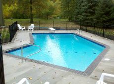 Gunite swimming pool with sapphire blue granite coping.jpg