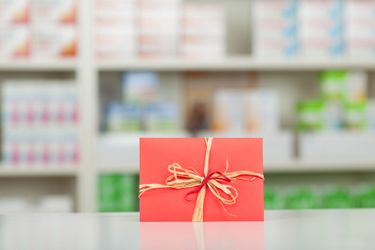 Image of a gift on a pharmacy counter Cards & Gifts