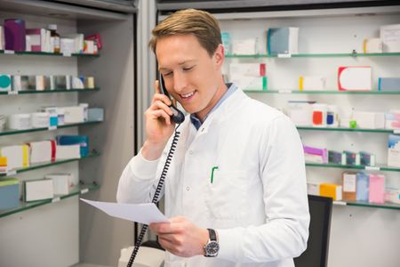 Pharmacist talking on a phone Emergency Services & On-Call