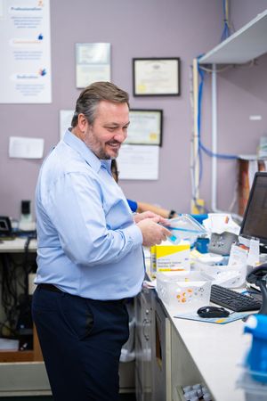 Pharmacy employee working Our Team