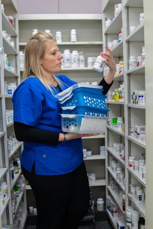 Pharmacy employee working Our Team