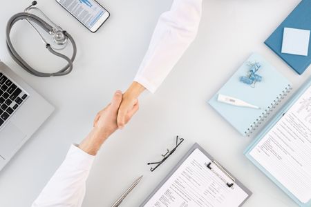 Two people shaking hands Business to Business