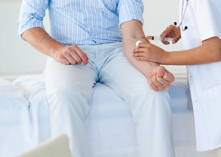 Person receiving a shot On-site Clinics