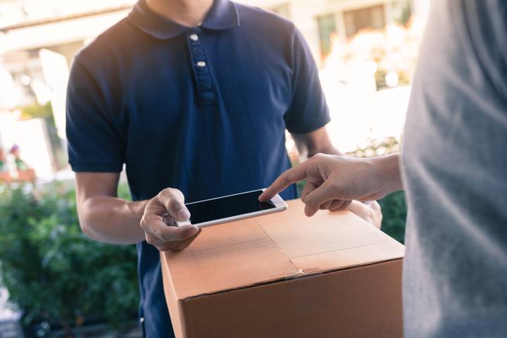 We offer local delivery services Image of someone receiving a package delivery
