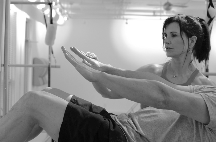 Kevin and Laura lift Pilates b&W  photo.PNG