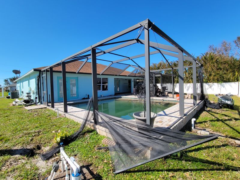 Screen Enclosure Damaged by Hurricane Winds