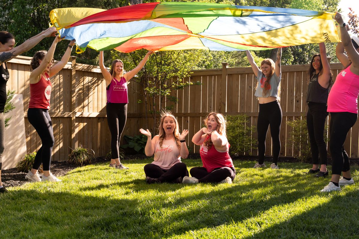 Team photo - Amanda & Ali parachute.jpg