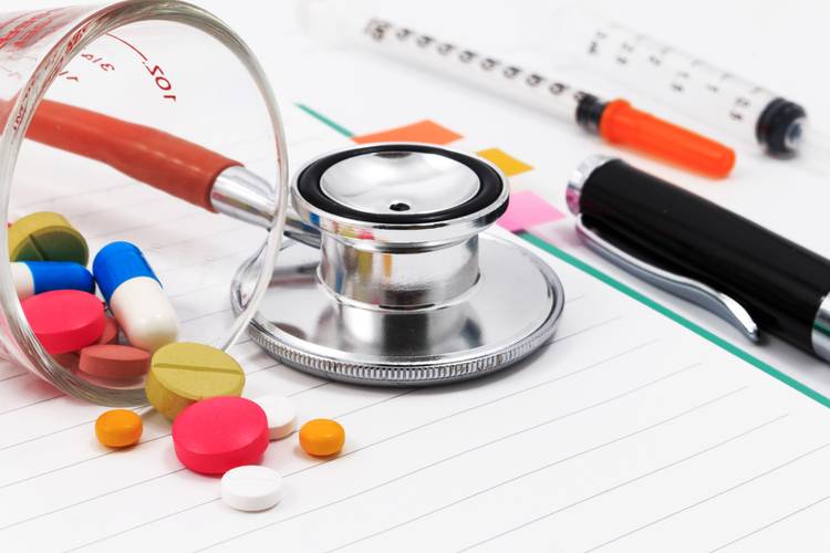 Stethoscope and medicine Medication Therapy Management