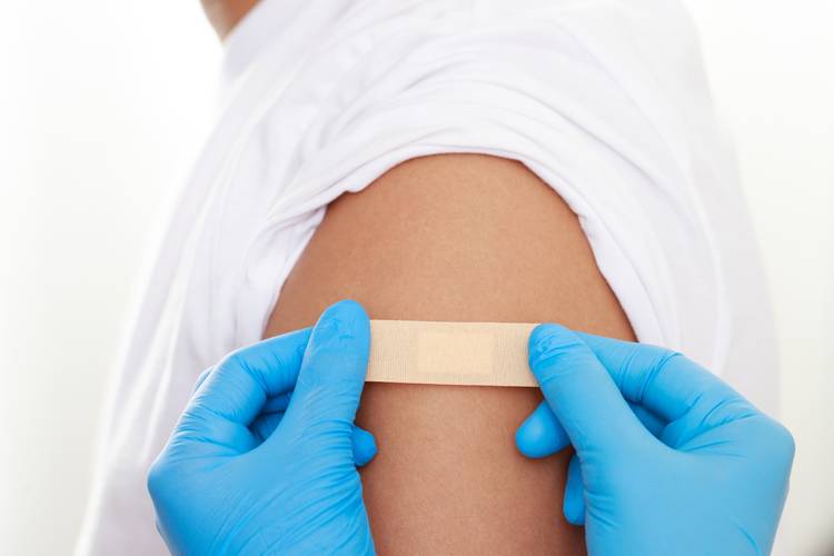 Person with a band aid on their arm Hepatitis B Vaccines