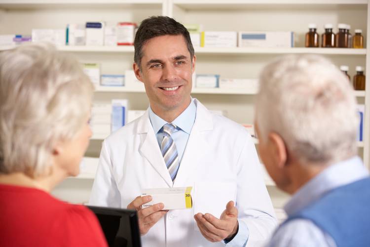 Pharmacist discussing medicine with patients Medication Therapy Management