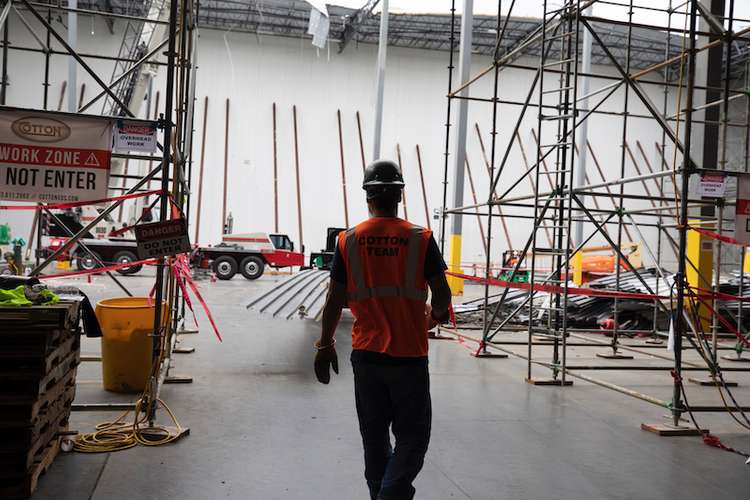 Cotton commercial disaster solutions team member in work zone in Panama City, FL