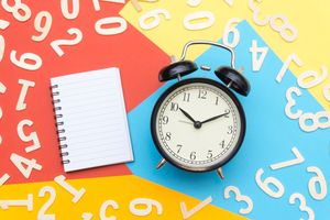 alarm-clock-lying-on-multicolored-surface-1314544 (1).jpg