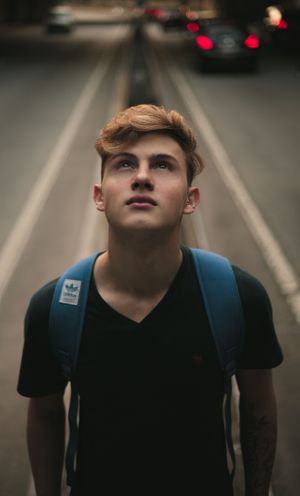 man-standing-in-the-middle-of-road-1553783-2.jpg