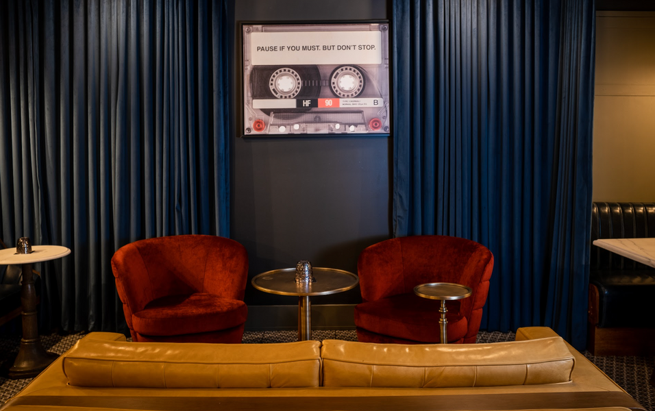 Seating at B-Side, Hotel Revival's Speakeasy Bar