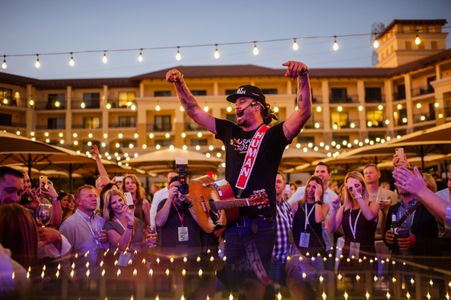 Michael Franti performs for guests at LITV during the Opening Reception at Vista Collina.jpg