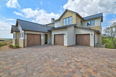 Six car garage with ample driveway space