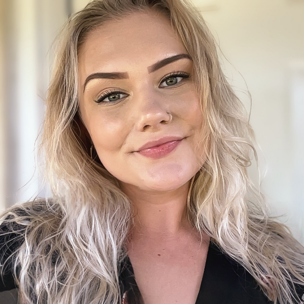 Emily Front Desk.png