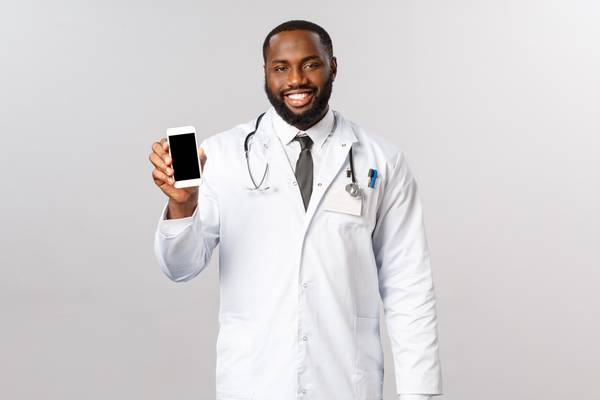 Pharmacist Holding Phone