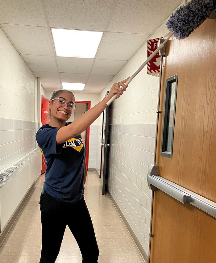 Buffalo, New York Happy Cleaner Mikaili working hard on cleaning the facilities down to the finest details!