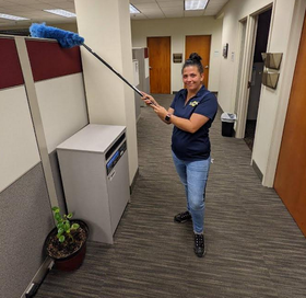 Clean Team Employee Cleaning Office
