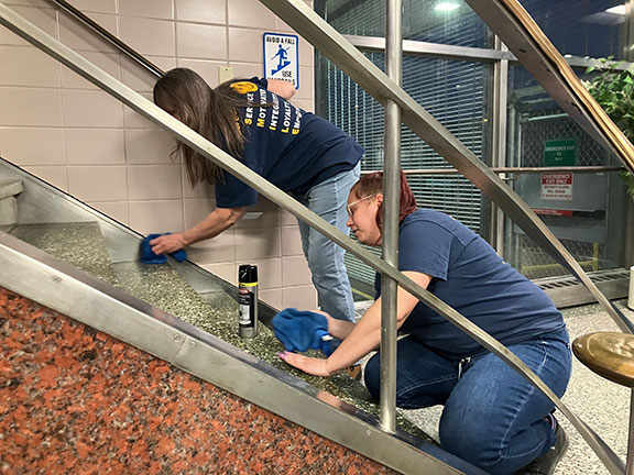 The team restored shine to the granite, removed buildup from tile and ledges, and eliminated fingerprints from railings—transforming a high-traffic staircase into a polished first impression, because at Clean Team, every detail matters, even the ones in b
