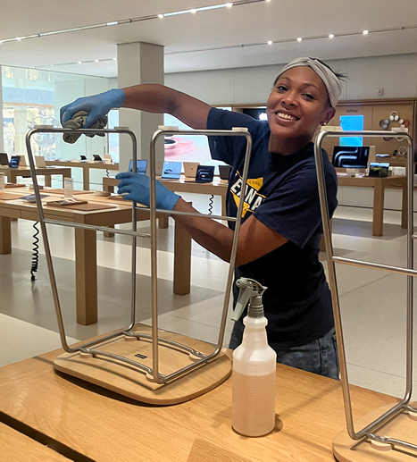 Buffalo, New York Cleaner Kara B working to clean the bottoms of the chairs in our customers showroom to keep their floors clean and scuff free.