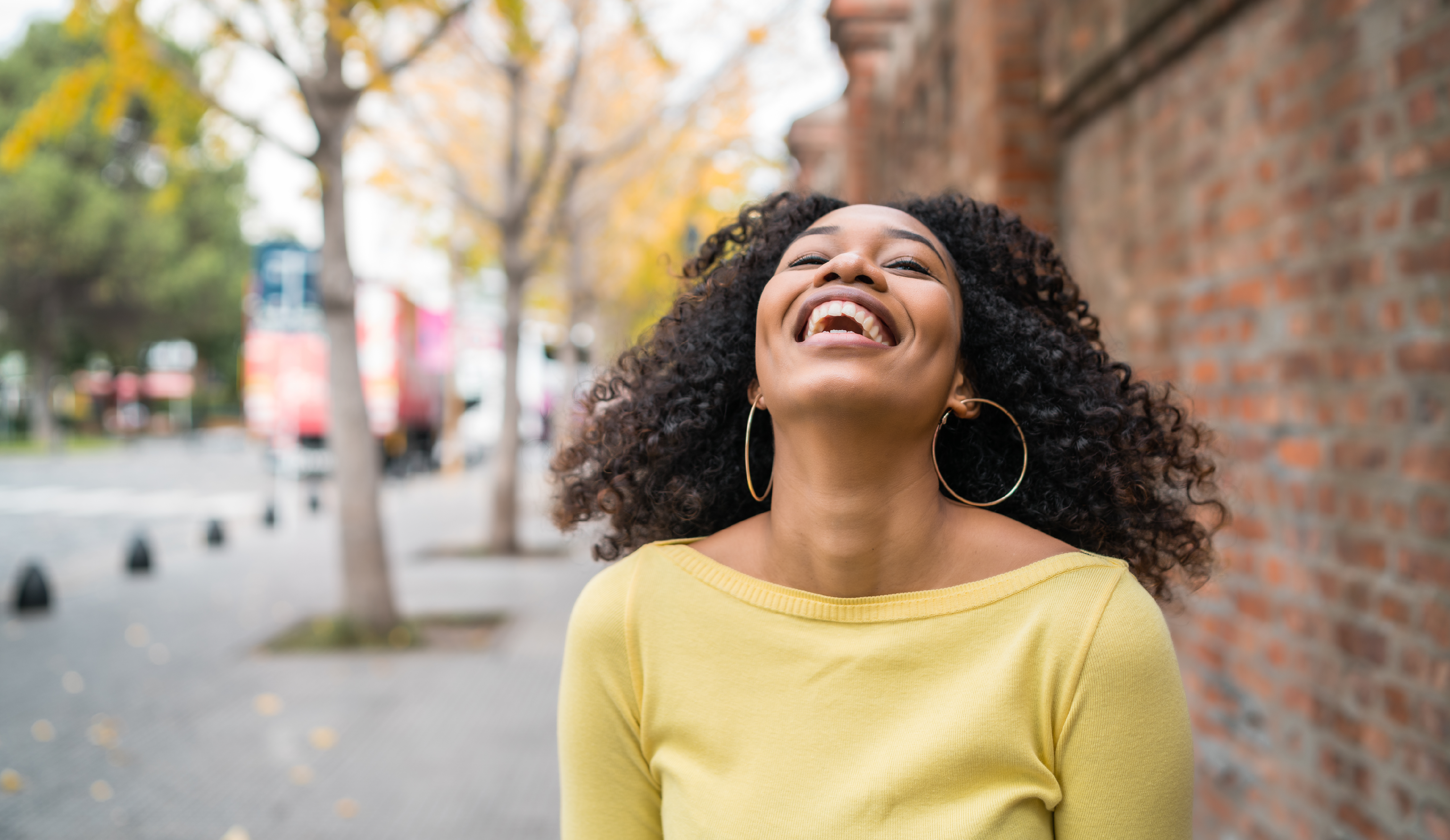 portrait-of-afro-american-woman-laughing-7GXNKXR-01.png