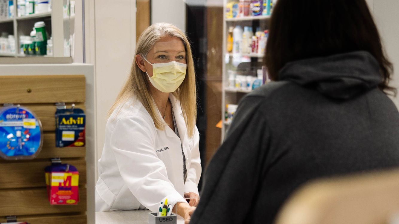 Amy-with-patient-Pharmacy-MSUHC21-0426.jpg