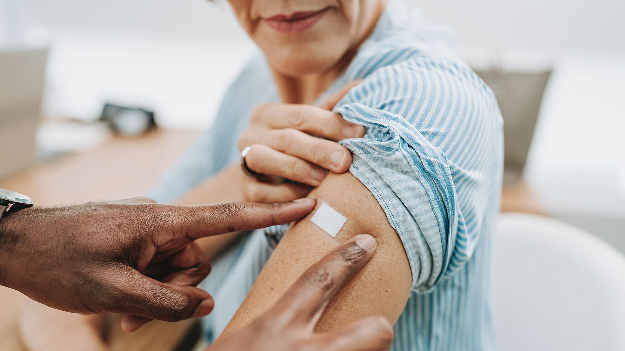 woman-getting vaccine-iStock-1935660240-2000x1125.jpg