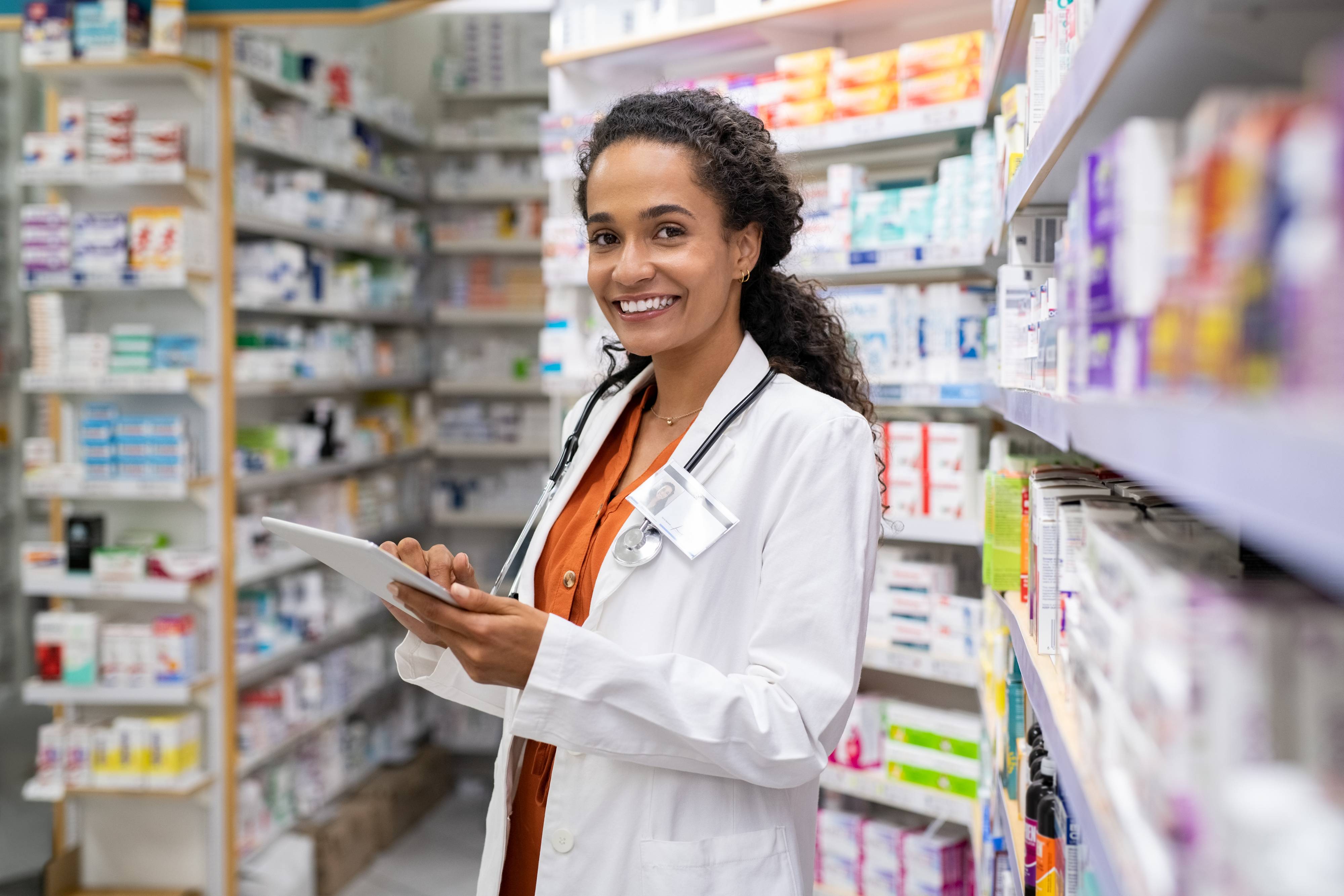 Pharmacist holding a clipboard New Pharmacy Patients