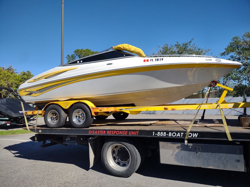 Rollback Wrecker for Boat Transport