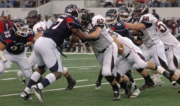 Nick Magnella provides protection for Michael Brewer. Magnella.jpg