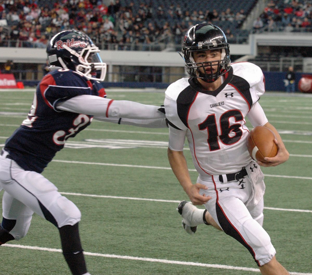 Michael Brewer beats a Ryan defender to the sideline. Brewer run.jpg