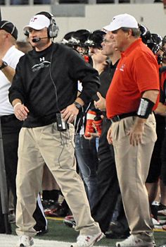 Head coach Hank Carter with former assistant George Oakes coaching in a title game inside at Cowboys Stadium. carter-oakes.jpg