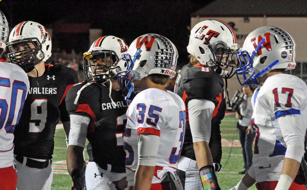 Cavaliers and Chaps shake hands following Lake Travis' 28-27 win in 2013. DSC_0222.jpg