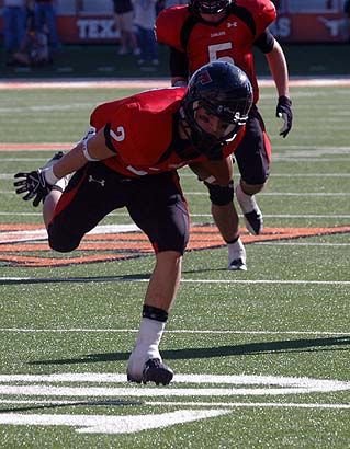 Cameron Wrinkle keeps his balance as he nears the goal line while returning a punt. DSC_0065.jpg