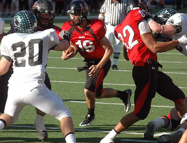 As Dannon Cavil (82) blocks, Michael Brewer looks for a path to the end zone. dsc_0114.jpg