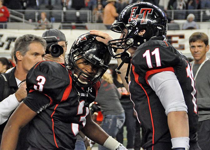 Shaun Nixon and Baker Mayfield celebrate in the closing moments. Nixon-Mayfield.jpg