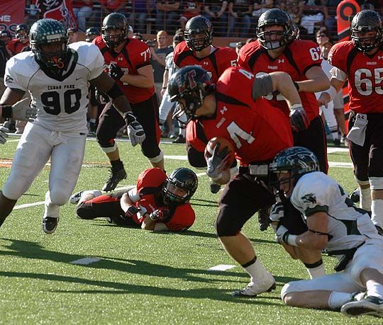 Colin Lagasse tries to lunge free from a tackle. DSC_0094.jpg