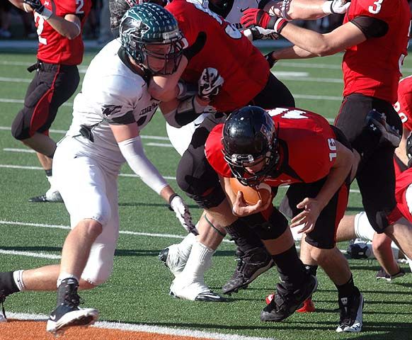 Michael Brewer dives into the end zone with the winning score. DSC_0115.jpg
