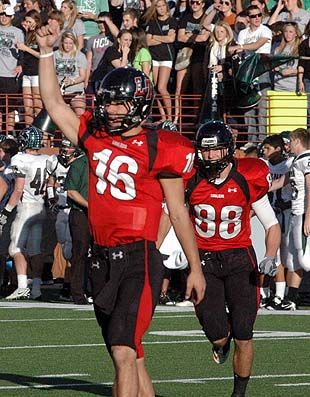 Michael Brewer and Conner Floyd begin Lake Travis' celebration. DSC_0173.jpg