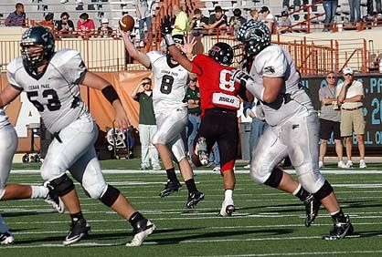 Shaq Marable pressures Cedar Park's Alex Curl. dsc_0145.jpg