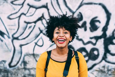 portrait-black-woman-smiling-outdoor-2022-01-19-00-31-46-utc.jpg