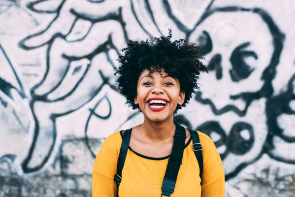 portrait-black-woman-smiling-outdoor-2022-01-19-00-31-46-utc.jpg