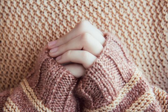 woman-in-a-beige-soft-warm-knitted-sweater-hold-hands-together-is-symbol-prayer-and-gratitude_t20_ynxz8L.jpg