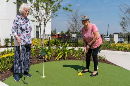 Residents playing golf at our Trelago community